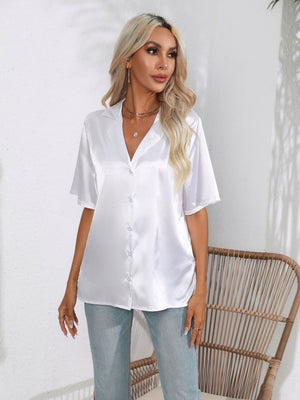 White satin collared short sleeve button-up shirt with a relaxed fit.