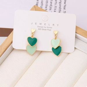 Charming double heart enamel earrings in dark green and light green with gold accents.