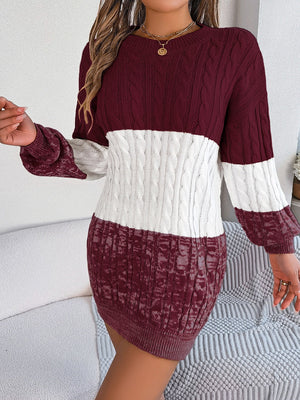 Colorblock cable knit mini dress in burgundy and white acrylic with crew neck and long sleeves.