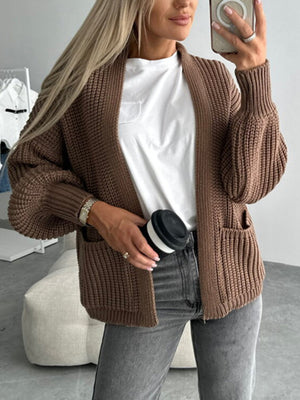 Textured puff sleeve mocha cardigan with pockets, open front, and ribbed knit detail.