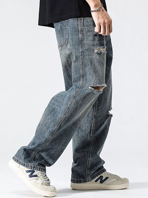 Men's Distressed Loose Fit Jeans in Blue, close-up detail