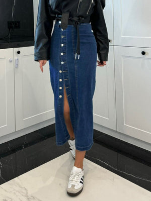 Button-front denim midi skirt in dark wash with a high slit and belt.
