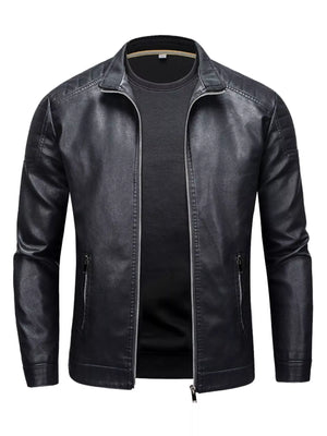 Black zip-up long-sleeve faux leather jacket with quilted shoulder details and zippered pockets.