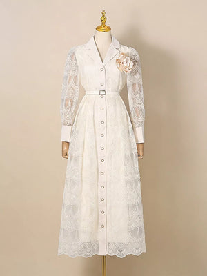White lace midi dress with collared neckline, button placket, and floral detail.