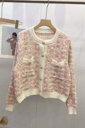 Textured bouclé knit cardigan in pastel multi-color with jewel buttons and patch pockets.