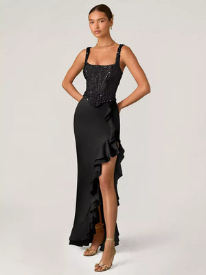 Black sequin ruffle maxi gown with square neckline and thigh-high slit.