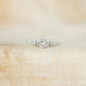 Silver pavé oval chain link ring with intricate detailing.