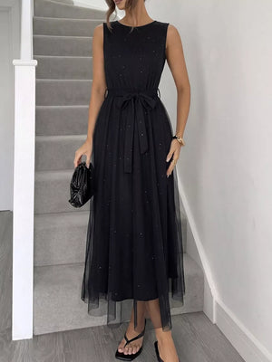 Black glitter tulle midi dress with sleeveless, round neck, and self-tie belt.