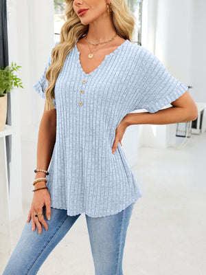 Light blue ribbed knit short sleeve t-shirt with decorative buttons and a curved hem.