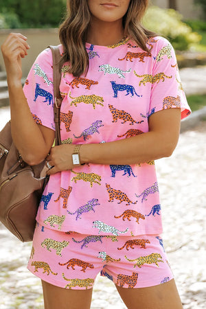 Pink leopard print loungewear set with crew neck tee and shorts.