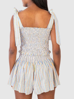 Rainbow striped smocked bodice and shorts set with tie shoulder straps.