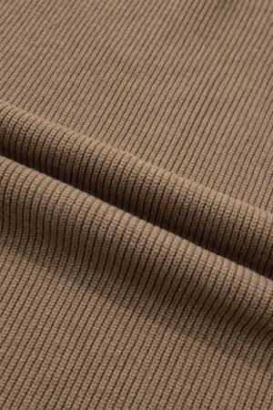 Ribbed knit mock neck sweater vest in brown polyester with a textured finish.