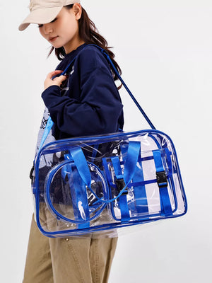 Chic clear PVC travel bag with blue accents and adjustable strap.