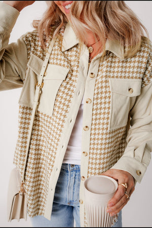 Beige houndstooth corduroy patchwork shacket with button front and chest pockets.