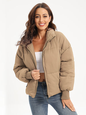 Camel padded bomber jacket with ribbed cuffs and collar, zipped front.