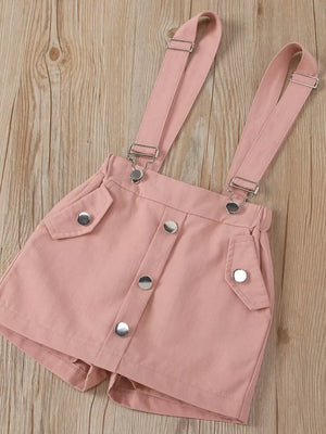 Pink cotton suspender shorts with button front and pocket details