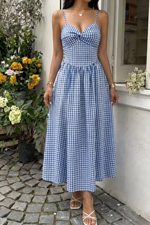 Blue gingham midi dress with sweetheart neckline and knot front detail.