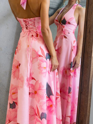 Pink floral halter neck maxi dress with lace-up back detail