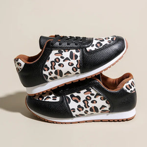 Black and caramel leopard print panel sneakers with leather accents.