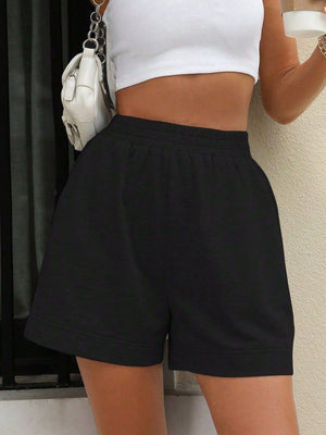 Black relaxed fit jogger shorts with elastic waistband and cuffed hem