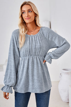 Light blue long sleeve blouse with gathered neckline and elastic waist