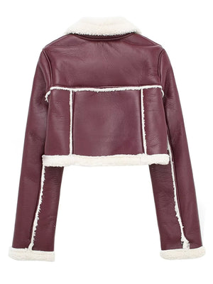 Burgundy cropped aviator jacket with white shearling trim and collar.
