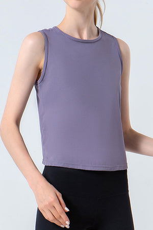 Lavender activewear tank top with round neckline and sleeveless cut.