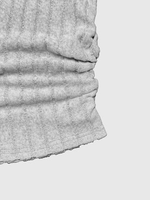 Grey ribbed knit crop top with ruched side detail and raw hem
