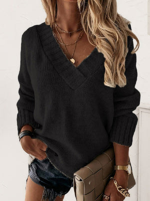 Black V-neck knit sweater with ribbed trim and cuffs.