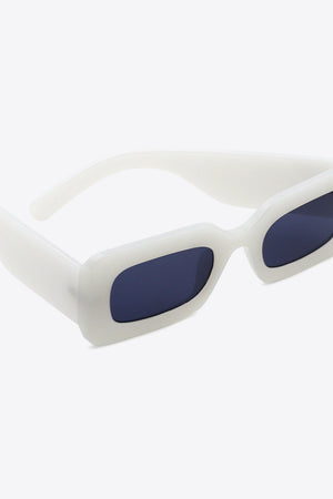 White acetate rectangle sunglasses with dark lenses.
