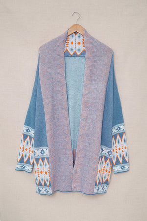 Blue knit open-front cardigan with geometric trim on sleeves and neckline.