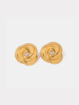 Gold swirl knot stud earrings with textured rope edge detail