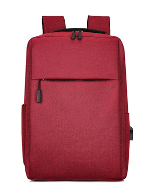 Burgundy canvas school backpack with front zipper pocket and USB port.