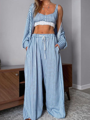 Blue striped three-piece lounge set with button-up cami, wide-leg pants and open cardigan.