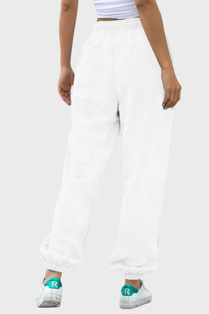 Relaxed-fit white cuffed sweatpants with a soft texture.