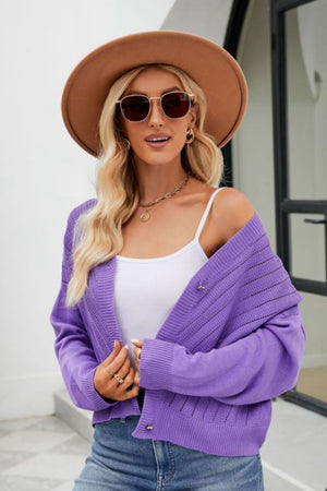 Purple textured stitch cropped V-neck cardigan with button details.