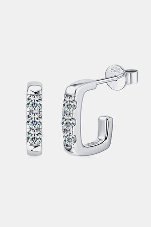 Silver square pavé moissanite hoop earrings with three stones each.