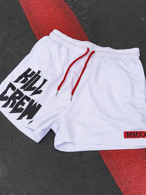 White athletic shorts with black "Kill Crew" graphic and red drawstring.
