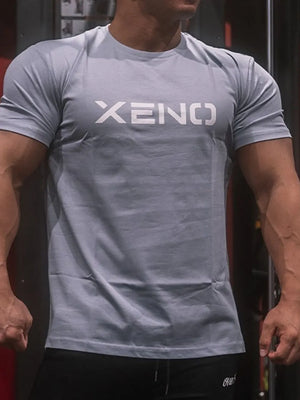 Gray athletic fit t-shirt with white XENO logo, crew neck, short sleeves.