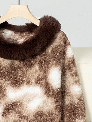 Faux fur trimmed camo poncho in chocolate with a textured knit and brown faux fur collar.