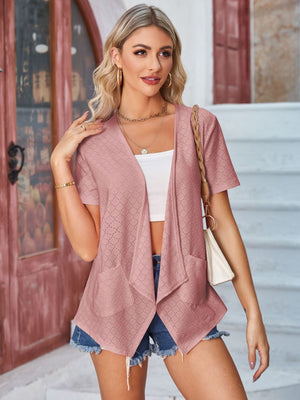 Blush pink perforated shawl collar jacket with short sleeves and pockets.
