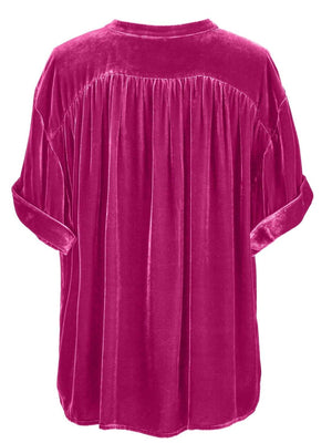 Velvet button-down top in cerise with mandarin collar and cuffed short sleeves.
