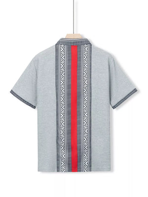 Men's gray short sleeve shirt with bold red and black geometric print panel.