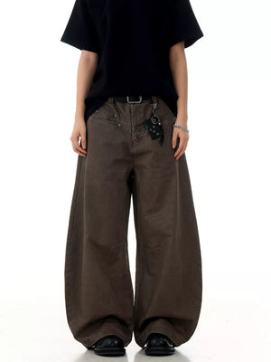 Brown wide-leg men's sweatpants with pockets and a relaxed fit.