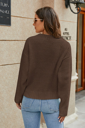 Burnt Umber ribbed knit sweater with a textured pattern, crew neck, and long sleeves.