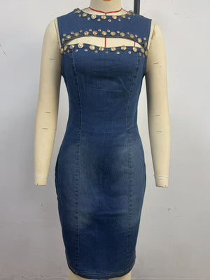 Embellished cutout denim dress with gold studs and a bodycon fit.