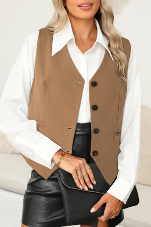 Camel V-neck button-down vest with button details and pockets, styled with a white shirt.