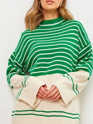 Green and cream striped knit sweater with bell sleeves and mock neck.