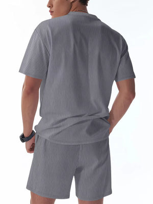 Men's relaxed fit two-piece set in light gray with vertical pinstripes.