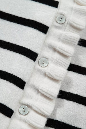 Chic striped black and white knit cardigan with ruffle trim and pearl buttons.